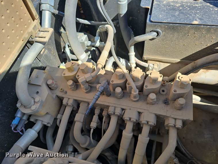 image for item DW3761 2010 Caterpillar M316D wheeled excavator