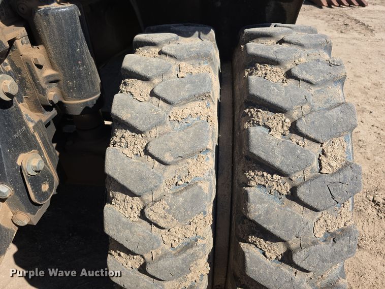 image for item DW3761 2010 Caterpillar M316D wheeled excavator