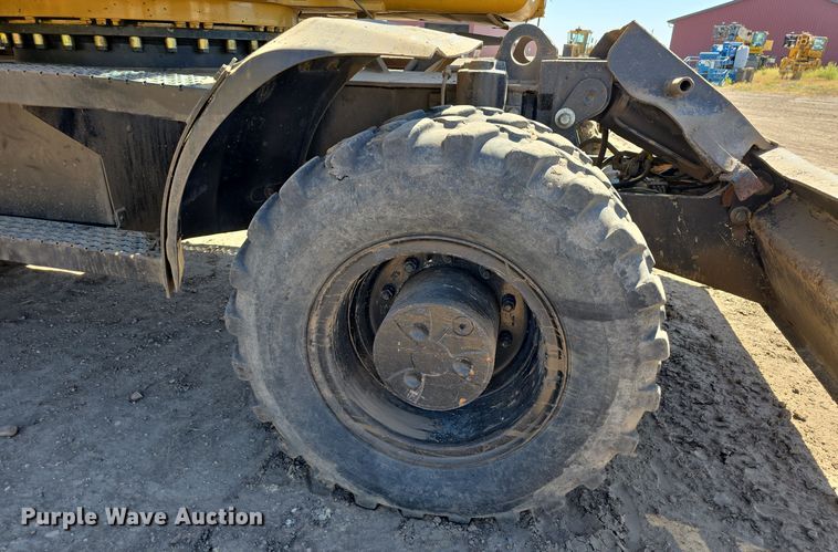 image for item DW3761 2010 Caterpillar M316D wheeled excavator