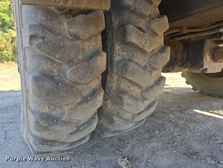 image for item DW3761 2010 Caterpillar M316D wheeled excavator