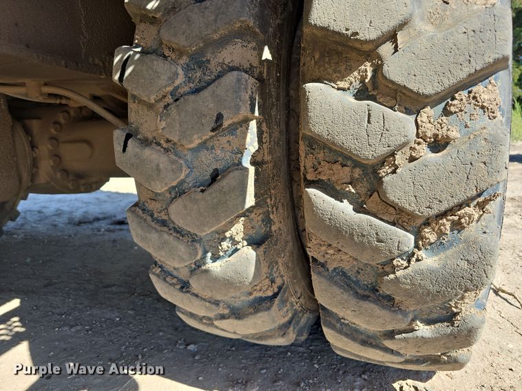 image for item DW3761 2010 Caterpillar M316D wheeled excavator