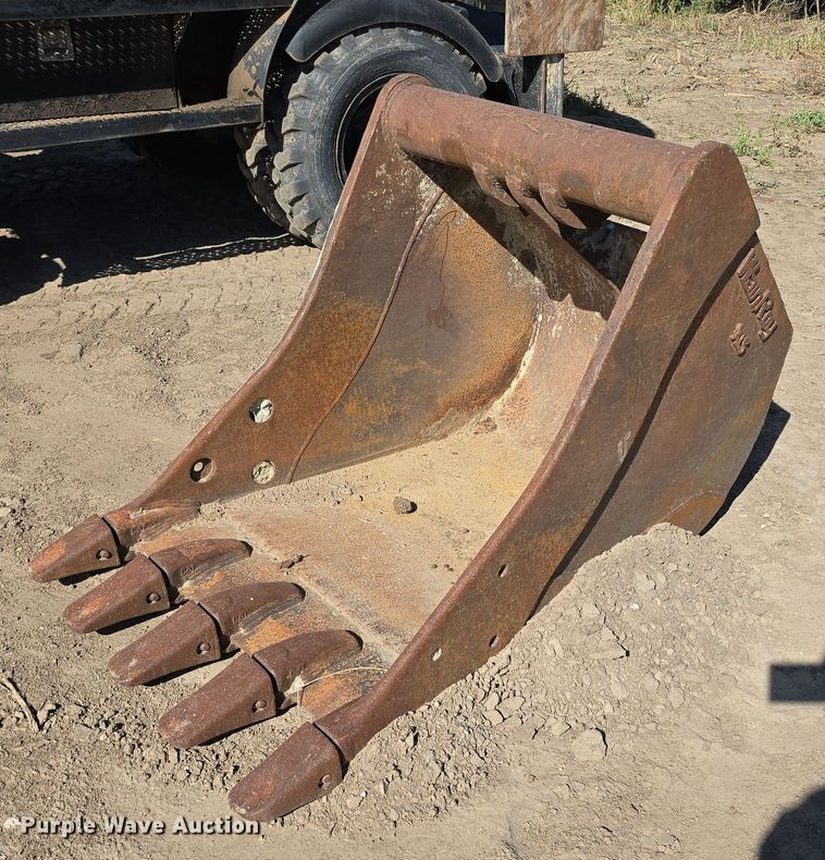 image for item DW3761 2010 Caterpillar M316D wheeled excavator