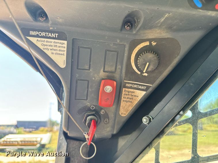 image for item DX3634 2015 John Deere 320E skid steer loader