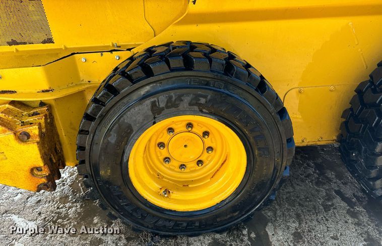 image for item DX3634 2015 John Deere 320E skid steer loader