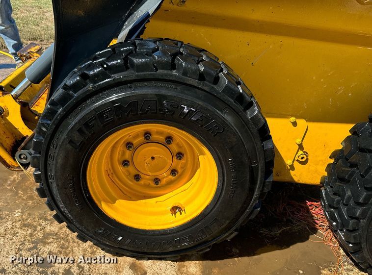 image for item DX3634 2015 John Deere 320E skid steer loader