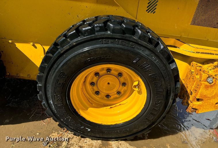 image for item DX3634 2015 John Deere 320E skid steer loader