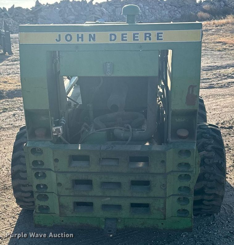 image for item DX3712 John Deere 170 skid steer loader