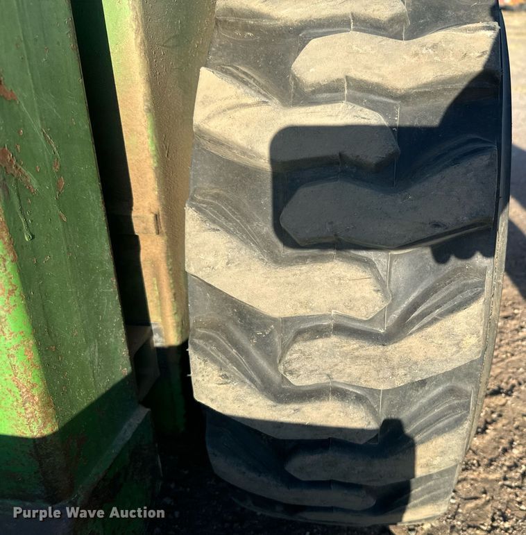 image for item DX3712 John Deere 170 skid steer loader