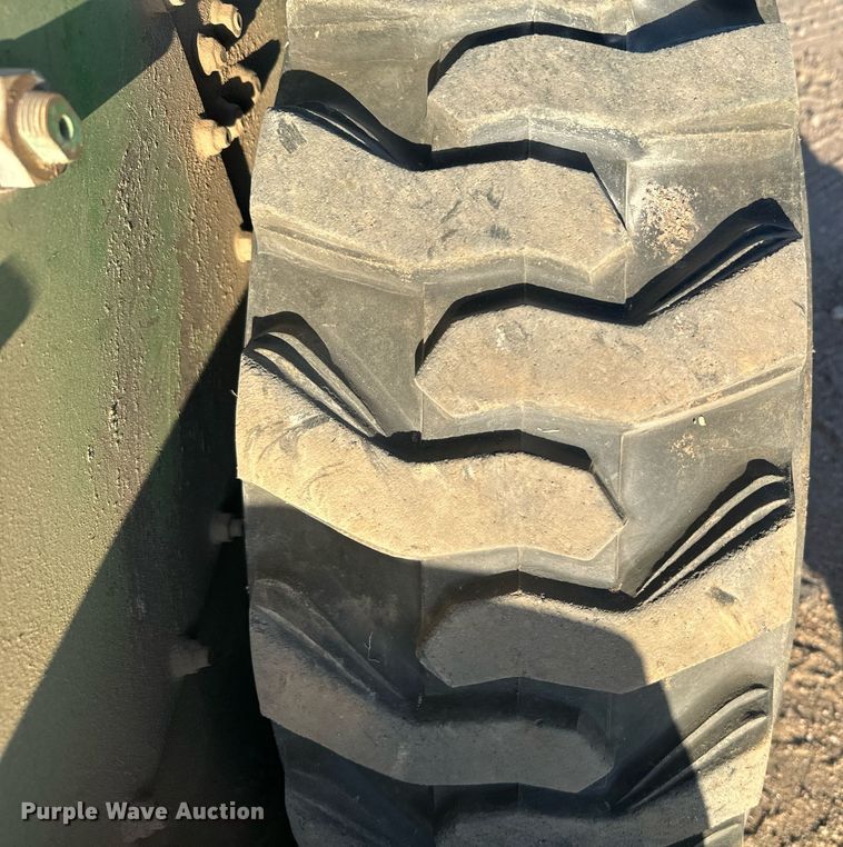 image for item DX3712 John Deere 170 skid steer loader