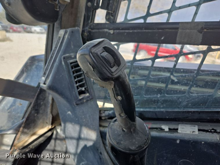 image for item EE7824 2011 John Deere 328D skid steer loader