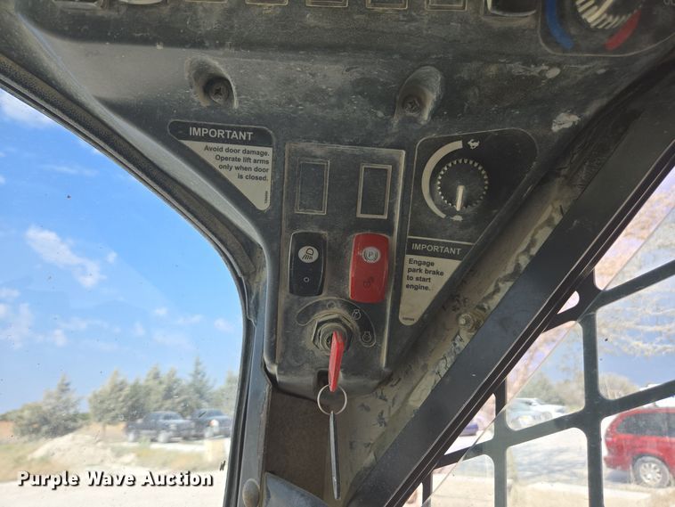 image for item EE7824 2011 John Deere 328D skid steer loader