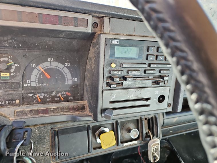 image for item EK0961 1999 GMC 7500 chipper truck