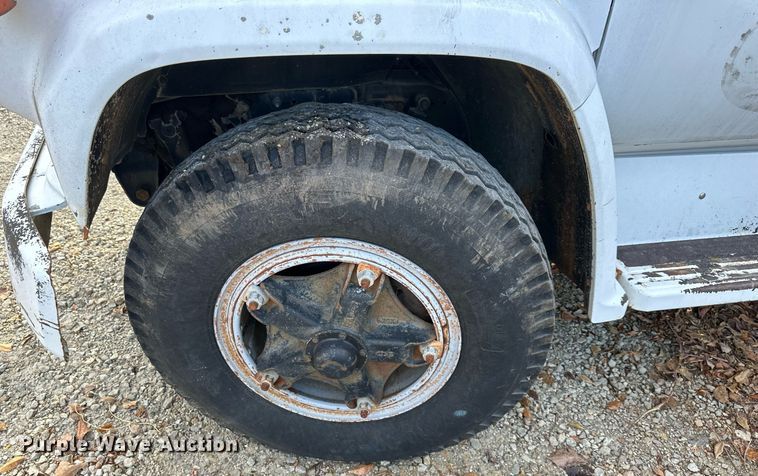 image for item DR2734 1990 GMC 7000 digger derrick truck