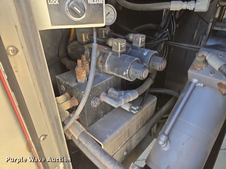 image for item EE8630 2009 Sutphen Mini Tower 75' 4 section  Quint fire truck