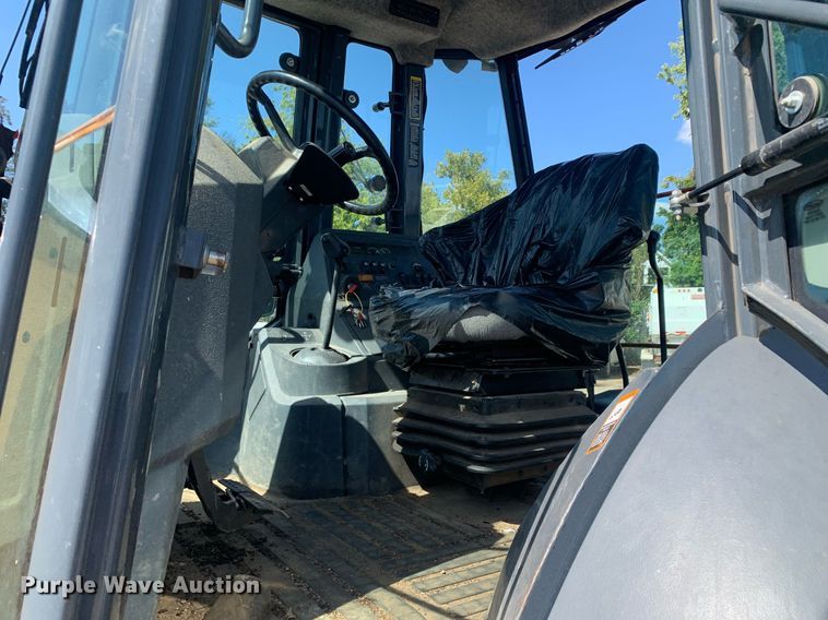 image for item JT9705 2016 John Deere  310L backhoe