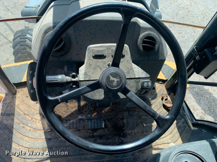 image for item JT9705 2016 John Deere  310L backhoe