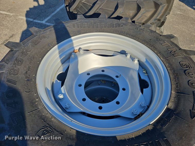 image for item OJ9882 (8) 340/85R24 tires and wheels