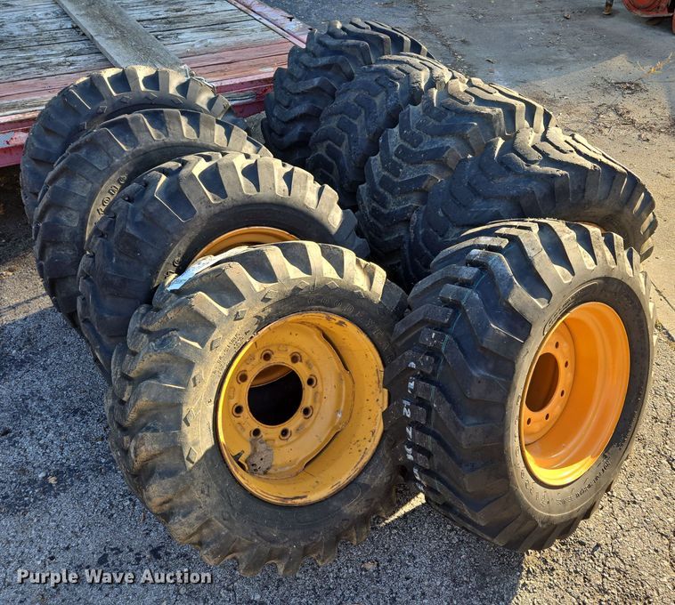 image for item EE8677 (9) 12-16.5 tires and wheels