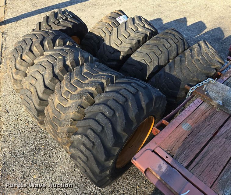 image for item EE8677 (9) 12-16.5 tires and wheels