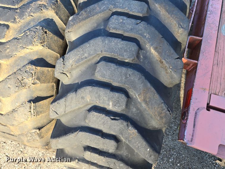 image for item EE8677 (9) 12-16.5 tires and wheels