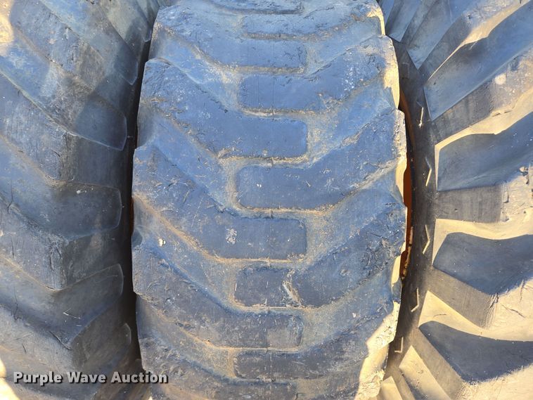 image for item EE8677 (9) 12-16.5 tires and wheels