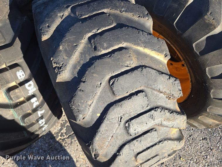 image for item EE8677 (9) 12-16.5 tires and wheels