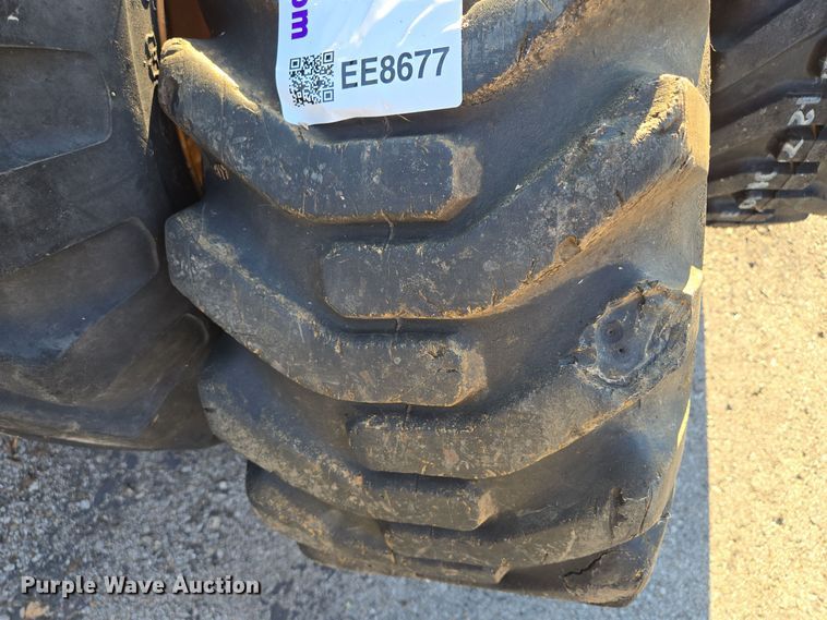 image for item EE8677 (9) 12-16.5 tires and wheels