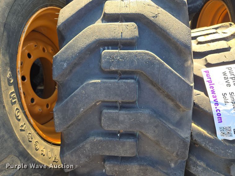 image for item EE8677 (9) 12-16.5 tires and wheels