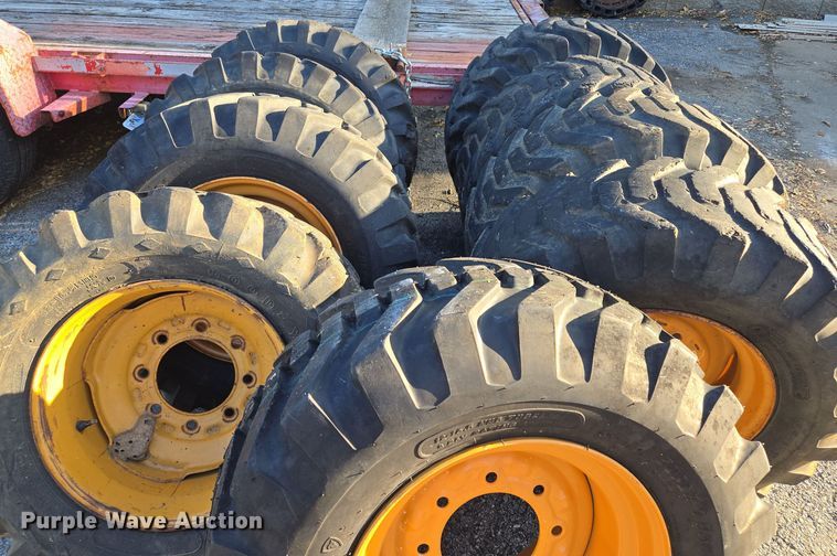 image for item EE8677 (9) 12-16.5 tires and wheels