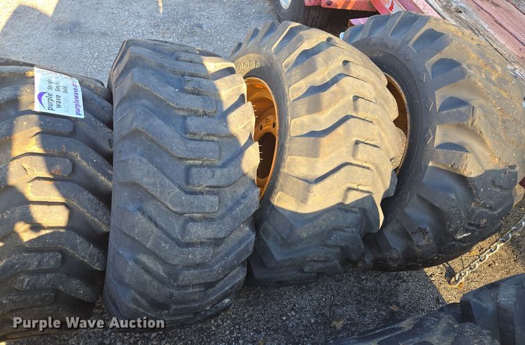 image for item EE8677 (9) 12-16.5 tires and wheels
