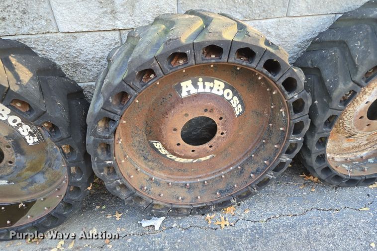 image for item EE8678 (4) skid steer solid tires and wheels