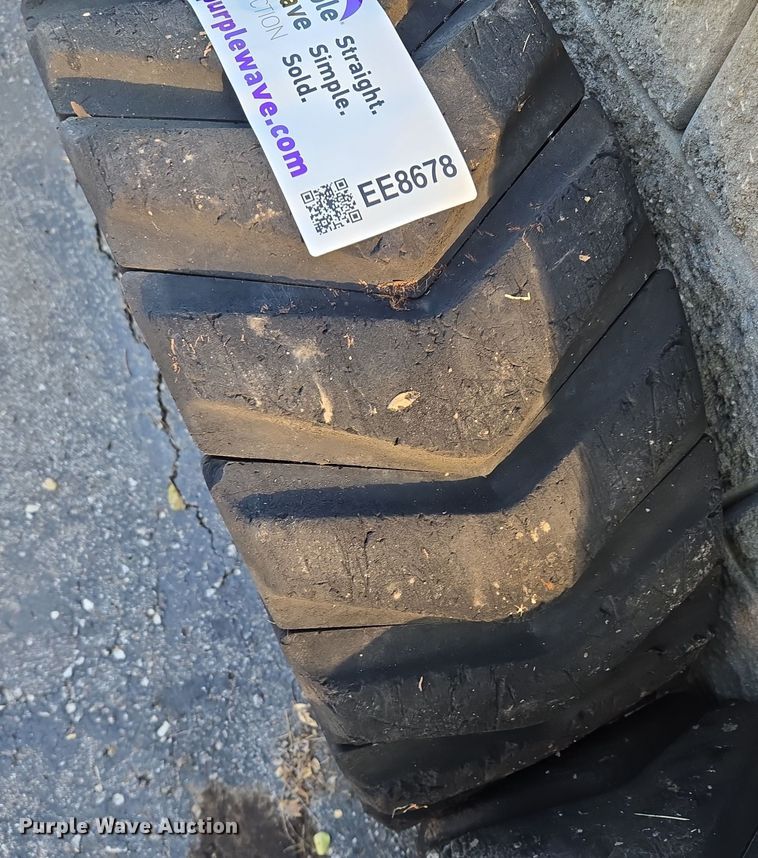 image for item EE8678 (4) skid steer solid tires and wheels