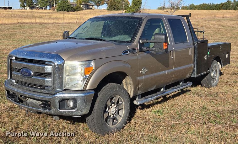 image for item EI4061 2012 Ford F350 Super Duty Crew Cab flatbed pickup truck