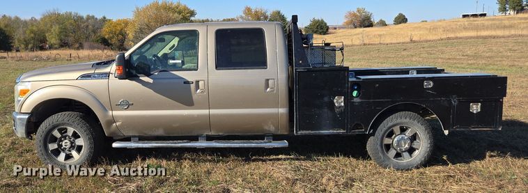 image for item EI4061 2012 Ford F350 Super Duty Crew Cab flatbed pickup truck