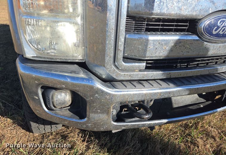 image for item EI4061 2012 Ford F350 Super Duty Crew Cab flatbed pickup truck