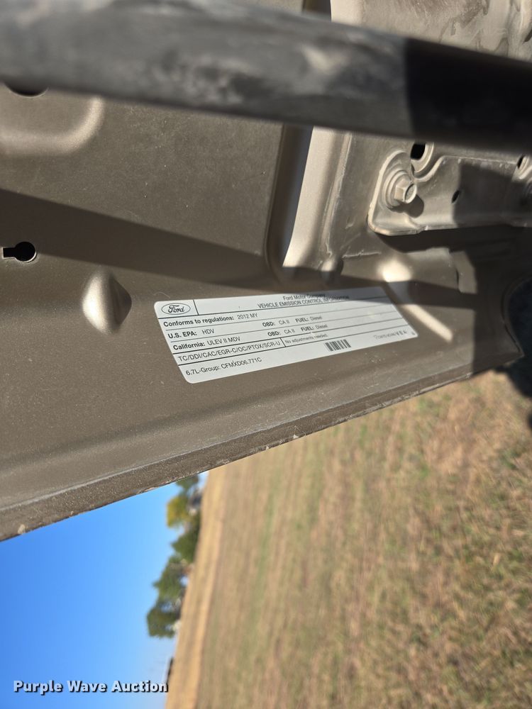 image for item EI4061 2012 Ford F350 Super Duty Crew Cab flatbed pickup truck