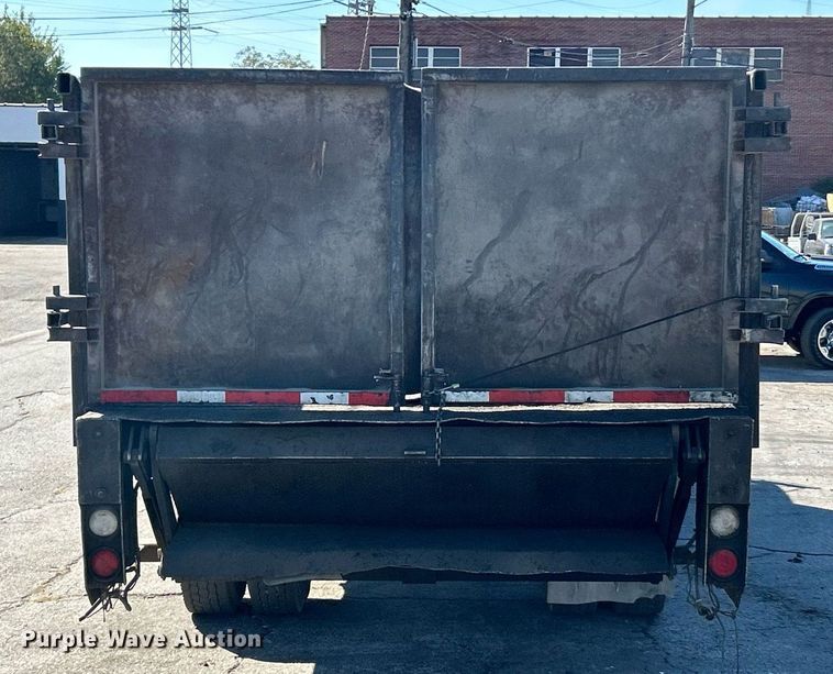 image for item EK3597 2003 Freightliner FL70  flatbed truck