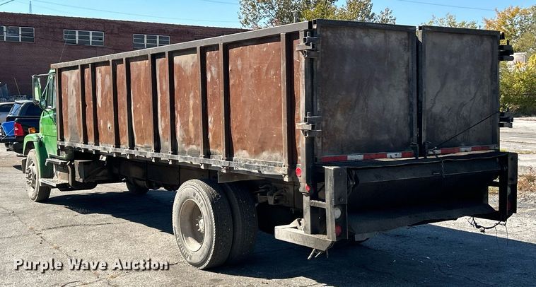 image for item EK3597 2003 Freightliner FL70  flatbed truck