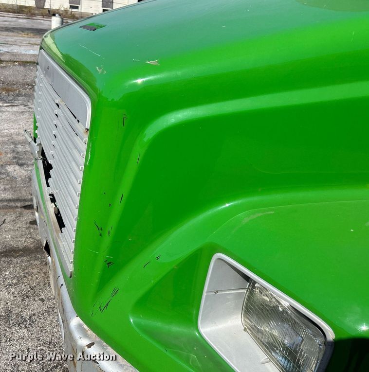 image for item EK3597 2003 Freightliner FL70  flatbed truck