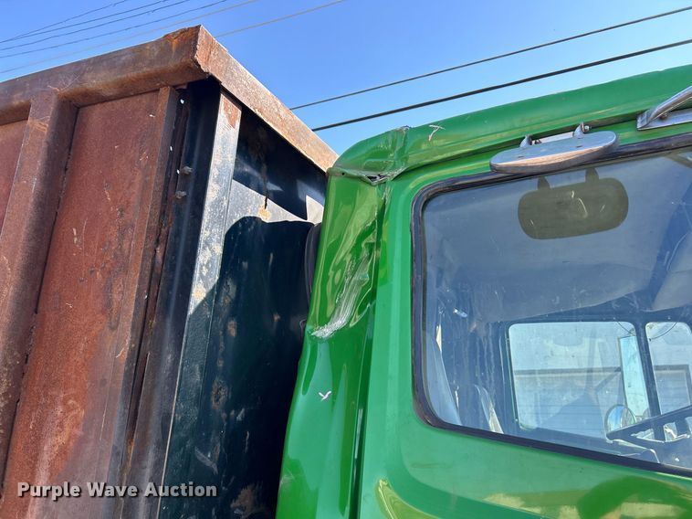 image for item EK3597 2003 Freightliner FL70  flatbed truck