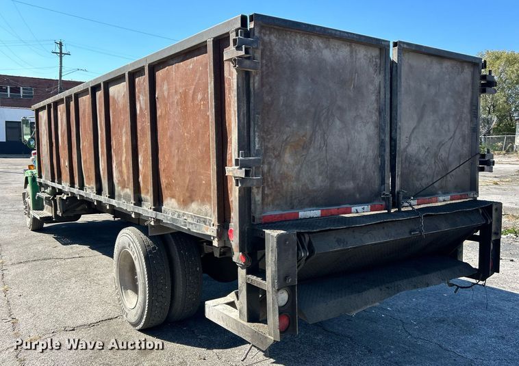 image for item EK3597 2003 Freightliner FL70  flatbed truck