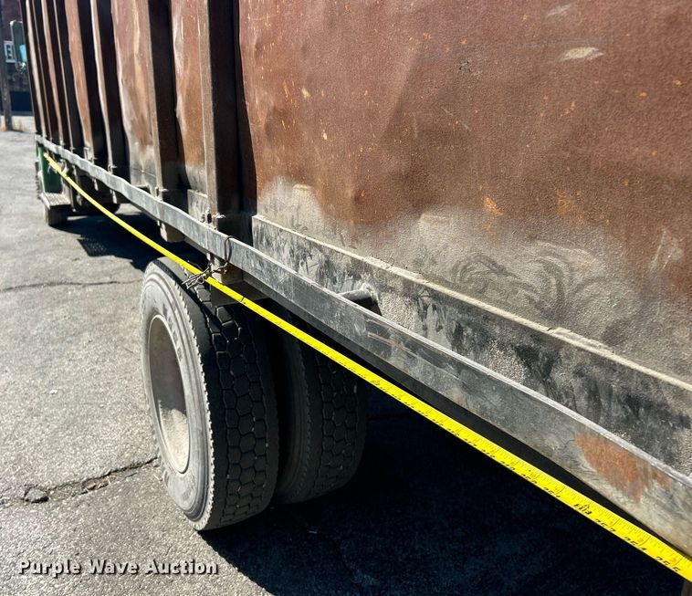 image for item EK3597 2003 Freightliner FL70  flatbed truck