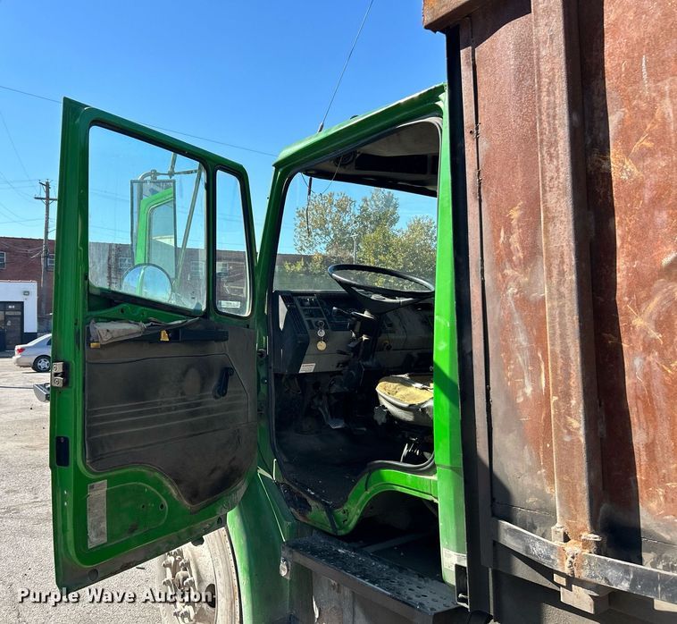 image for item EK3597 2003 Freightliner FL70  flatbed truck