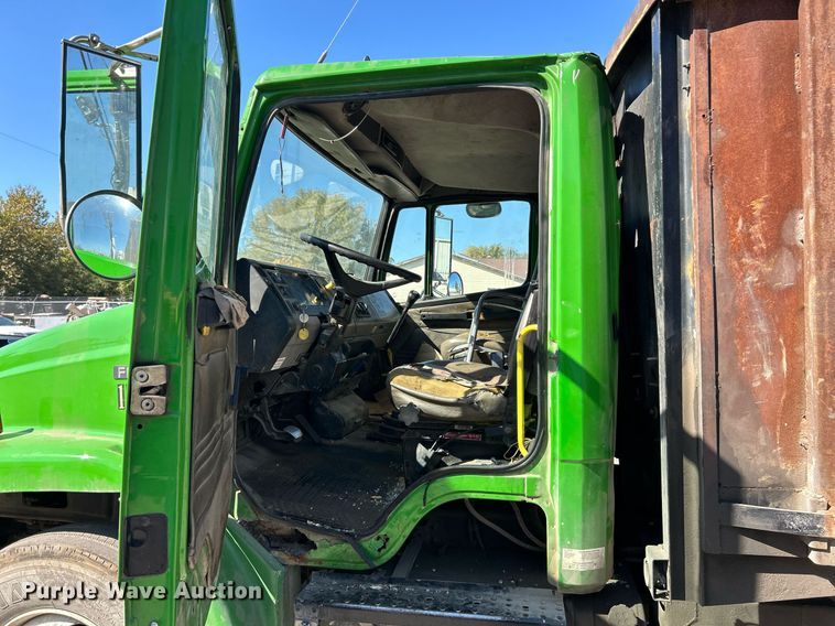 image for item EK3597 2003 Freightliner FL70  flatbed truck