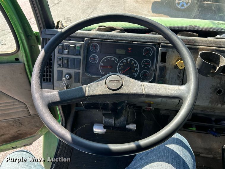 image for item EK3597 2003 Freightliner FL70  flatbed truck