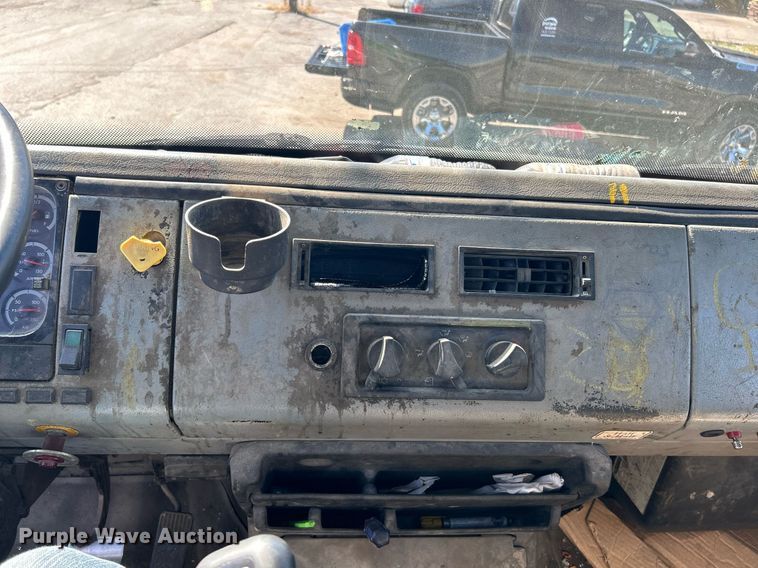 image for item EK3597 2003 Freightliner FL70  flatbed truck