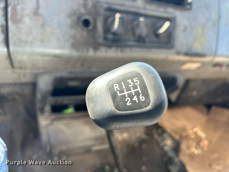 image for item EK3597 2003 Freightliner FL70  flatbed truck