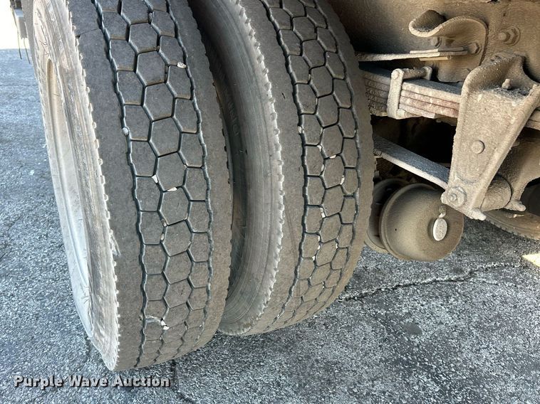 image for item EK3597 2003 Freightliner FL70  flatbed truck