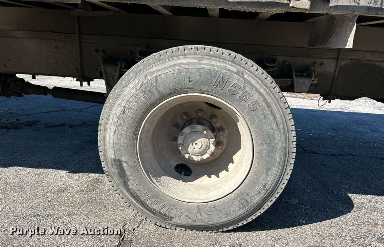 image for item EK3597 2003 Freightliner FL70  flatbed truck