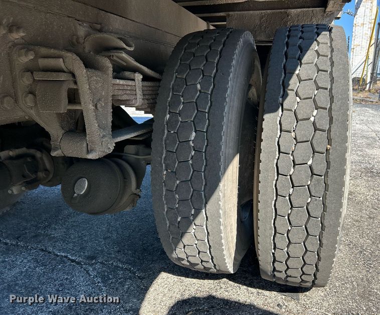 image for item EK3597 2003 Freightliner FL70  flatbed truck